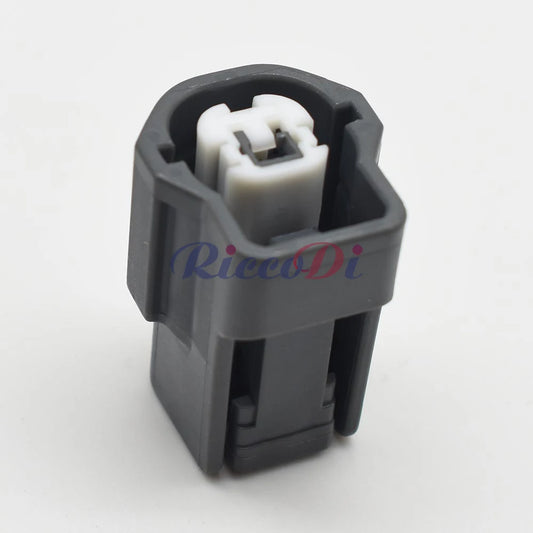 Close-up of terminal on 2.3mm automotive electrical plastic housing plug 6098-2329 showing waterproof design for stable connections