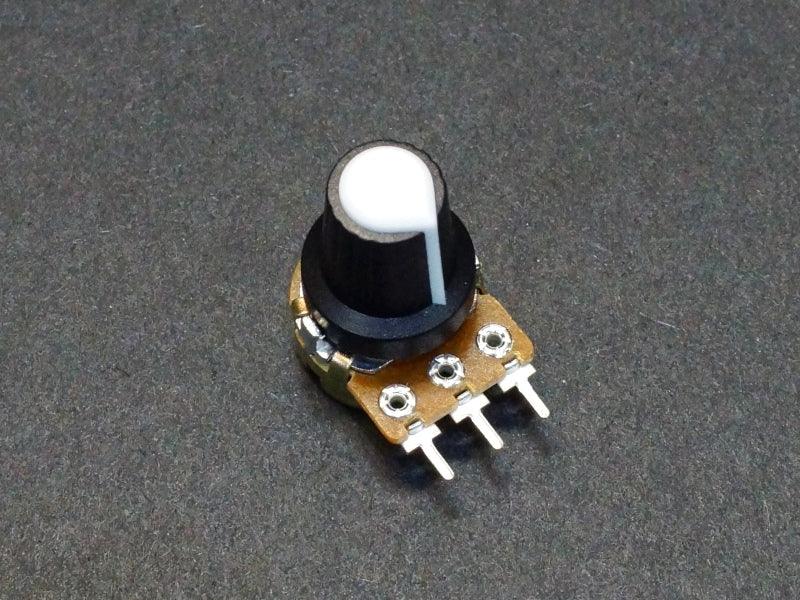 Potentiometer-Control-Knob-White-Plastic-On-Potentometer