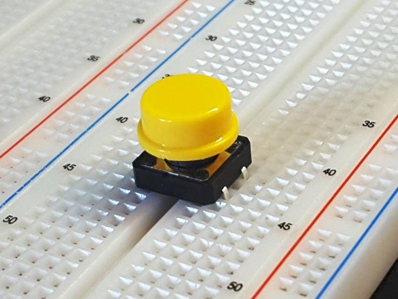Tactile-Pushbutton-Square-12mm-On-Breadboard_0a764be4-cacd-4cb4-9998-e29ec5182e0f