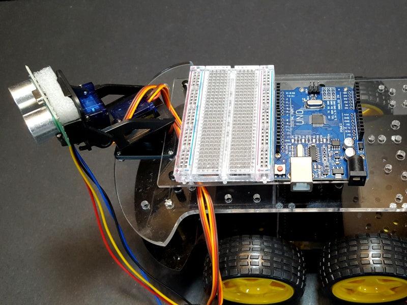 Uno-Acrylic-Base-Mounted-on-Robotic-Vehicle