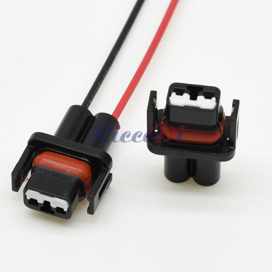Close-up of 2-hole automotive AC valve connector DJ70216Y-1-21 highlighting secure pins and plug housing
