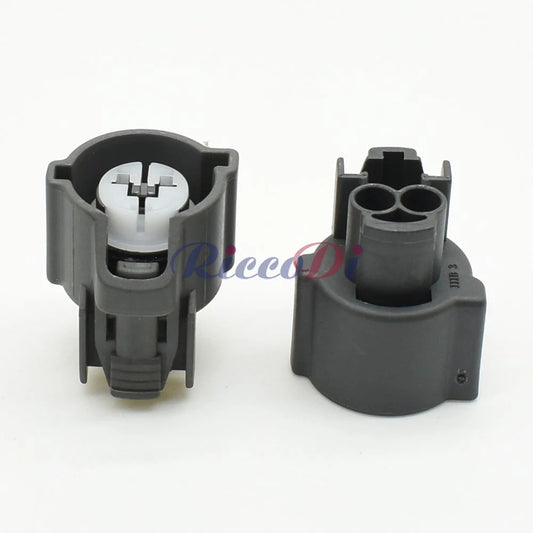Close-up of male side of 2-pin automotive connector DJ70230C highlighting sealed terminals for reliable connection