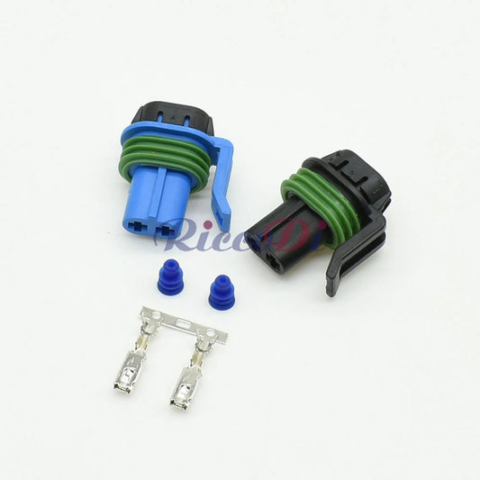 Close-up of 2 pin terminals on automotive fog light wire harness connector for secure connection