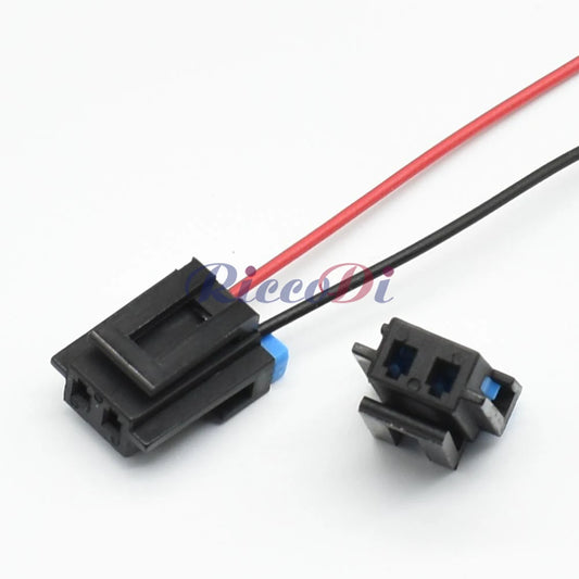 Close-up of automotive 1.5mm wire connector showing secure waterproof male and female socket interface