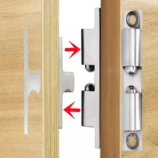 Close-up of brass double roller spring ball catch latch for doors and cabinets
