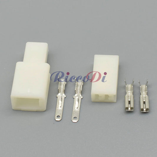 Close-up of terminals on 2.8 series automotive compressor wire connector for secure electrical connection
