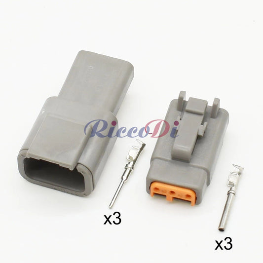 Close-up of 3 pin Deutsch automotive connector terminals ATM04-3P ATM06-3S DTM06-3S DTM04-3P waterproof grey socket male & female