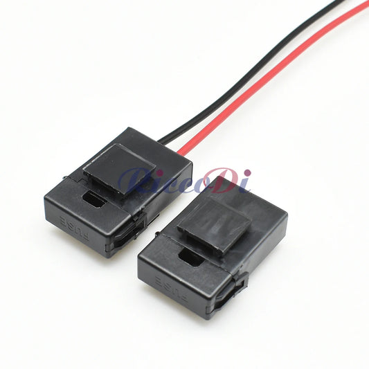side view of black car fuse holder showing terminal connections for safe vehicle wiring