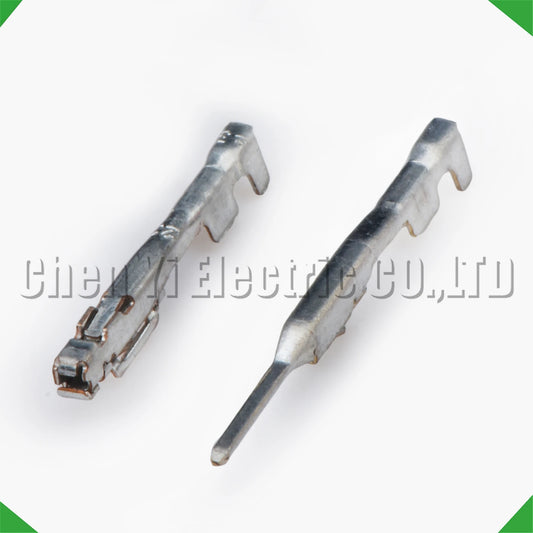 Close-up of 0.6 mm male and female wire crimp pins for automotive connectors
