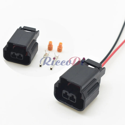 Close-up of 2-pin waterproof oil temp sensor connector FQGE-MT-284 highlighting secure pins and plastic housing