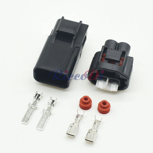 Sealed automotive fan plug connector shell providing protection against moisture and dust