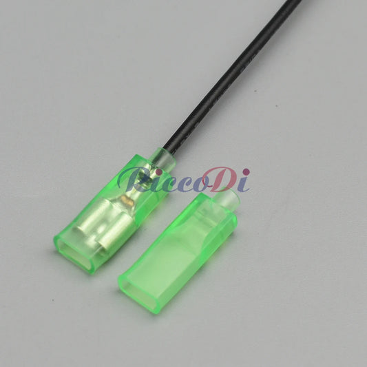 Close-up of 6.3mm spring terminal showing pin and green sheath for secure push button switch connection