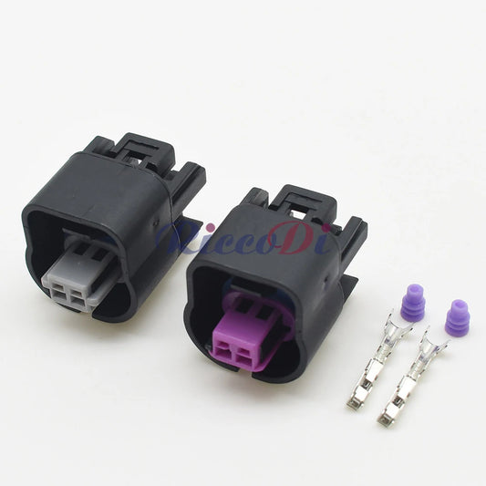 Close-up of terminals for 2 pin centerline automotive connector for camshaft VVT solenoid valve