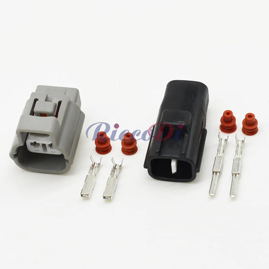 Close-up of automotive waterproof wire connector showing secure male and female interface