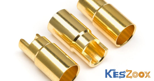 Gold-plated brass connector contacts - bullet connectors showing high-conductivity brass base material with gold plating