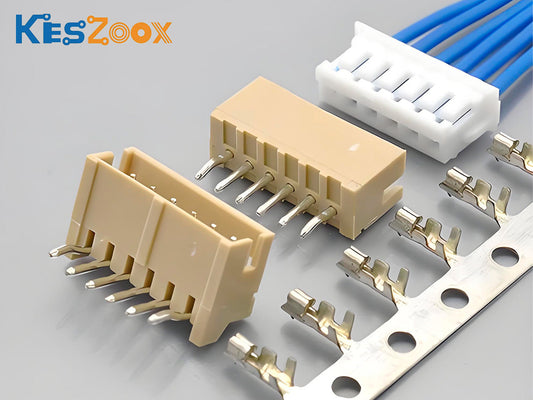 JST ZH 1.5mm connector complete system — B-ZH SMD through-hole PCB headers in beige, ZHR white wire housings with blue cable assemblies, and SZH crimp terminals on carrier strip, Keszoox
