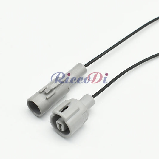 Close-up of 1 Pin grey automotive sensor connector showing male and female terminals for secure electrical connection
