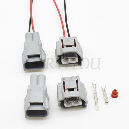 Close-up view of 2.2mm male and female sealed automotive connector interface for reliable electrical contact