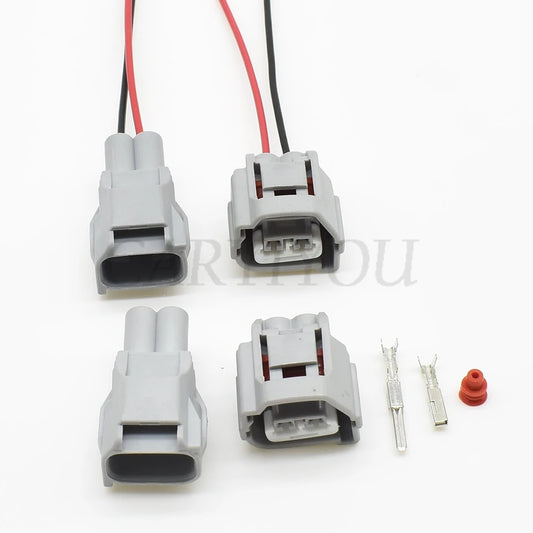 Close-up view of 2.2mm male and female sealed automotive connector interface for reliable electrical contact
