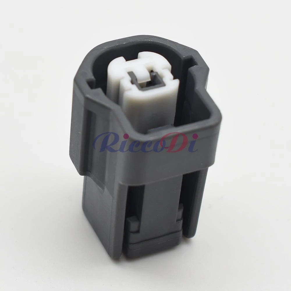 Close-up of terminal on 2.3mm automotive electrical plastic housing plug 6098-2329 showing waterproof design for stable connections