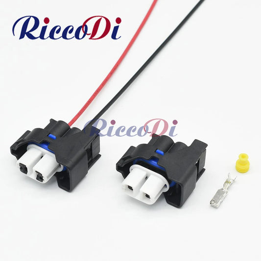 Front view of 2 hole automotive fog light connector plug with pins and waterproof seals