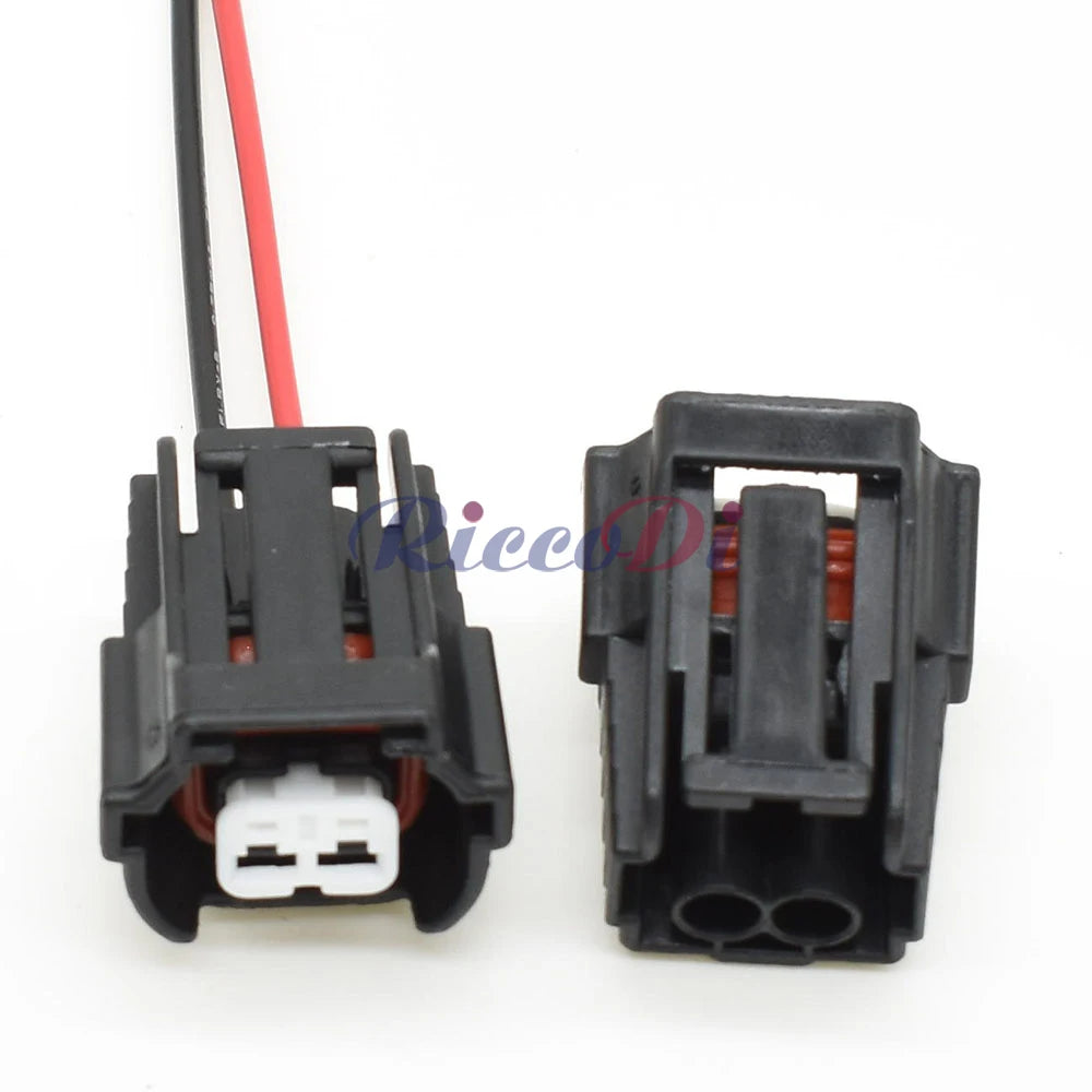 Close-up of terminals on 2 hole fuel injector wire socket connector for secure electrical connection