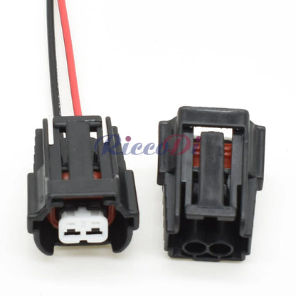 Close-up of terminals on 2 hole fuel injector wire socket connector for secure electrical connection