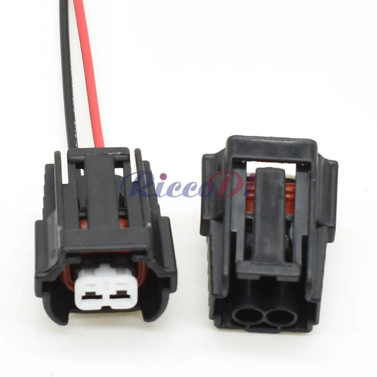 Close-up of terminals on 2 hole fuel injector wire socket connector for secure electrical connection