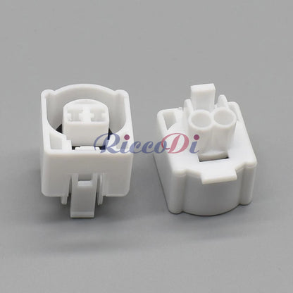 Detail of wires attached to white 2 pin automotive intake air temperature sensor waterproof connector
