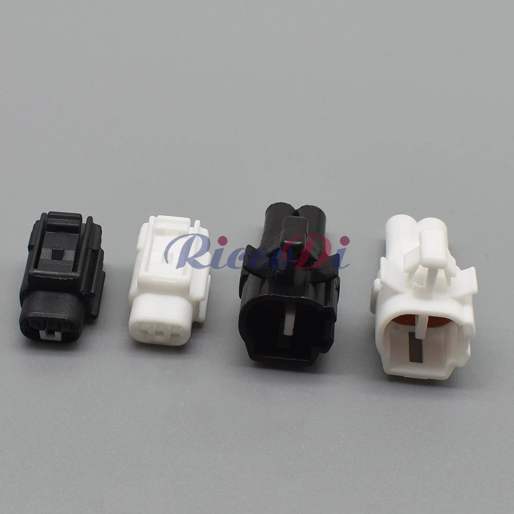 Female and male ends of 2-pin black automotive connector for reliable fog and taillight wiring