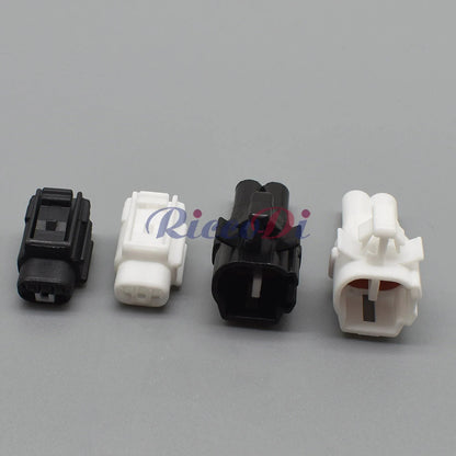 Female and male ends of 2-pin black automotive connector for reliable fog and taillight wiring