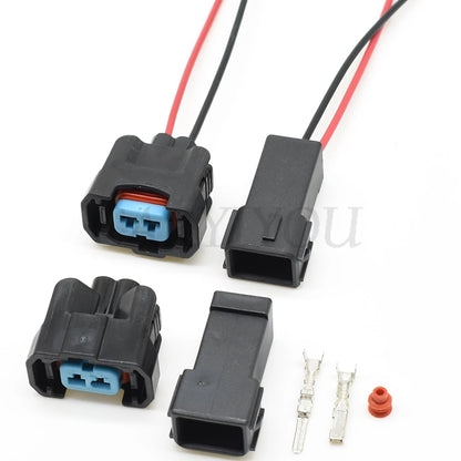 Demonstration of 2 Pin automotive fuel injector connector being inserted and removed for reliable Honda OBD2 system connection