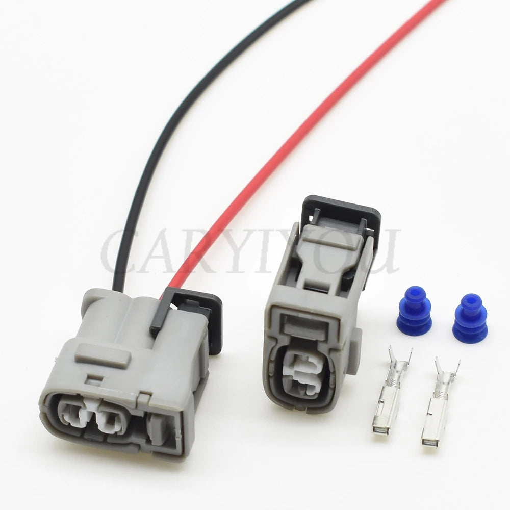2-Pin automotive plug connector installed on Hyundai Elantra ignition coil and injector harness