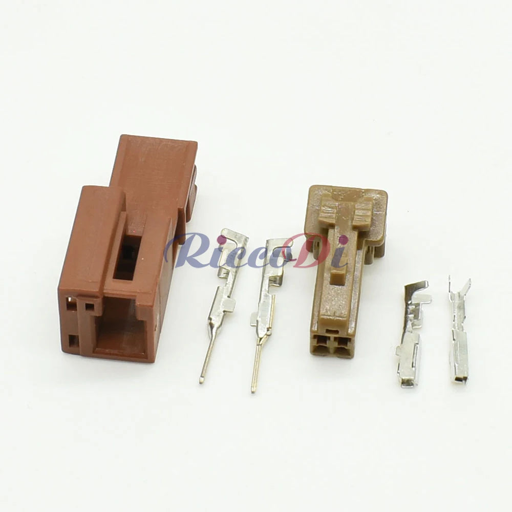 Close-up view of 2 pin automotive wire connector showing secure male and female socket interface