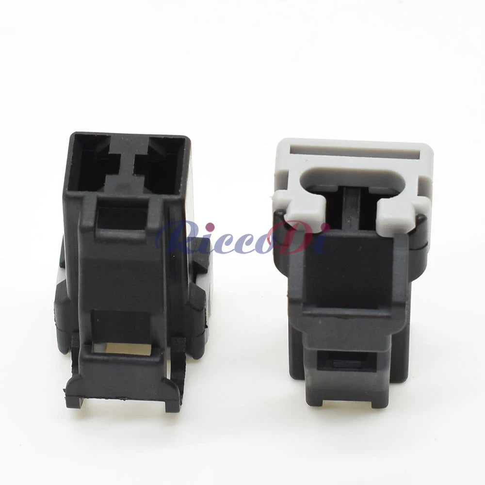 Detailed view of 2 pin automotive connector terminals for secure electrical connection