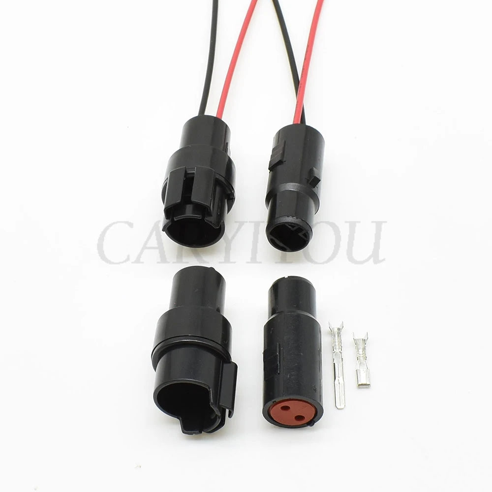 Detailed view of terminal pins and waterproof electric housing for secure car wiring connection