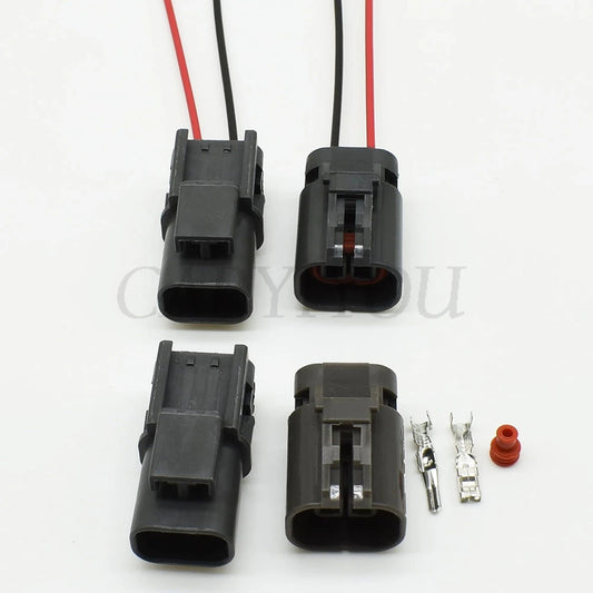 Detailed view of 2 pin automotive fan connector terminals for secure electrical connection