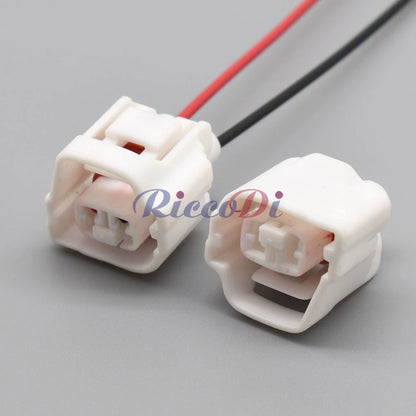 Rear view of 2-pin waterproof automotive connector highlighting wire attachment for AC assembly