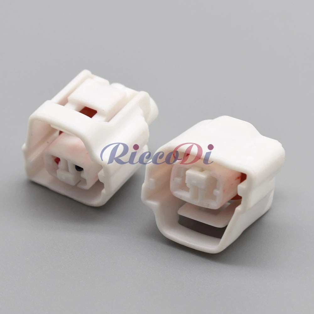 White 2-pin car connector made of durable, waterproof material ensuring stable electrical connection