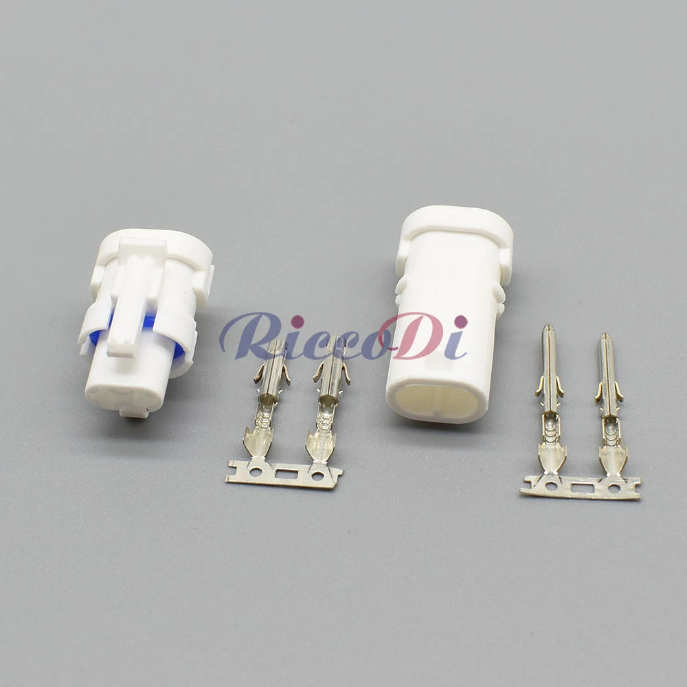 Close-up of 2-way male female auto connector plug highlighting precise fit and secure wiring