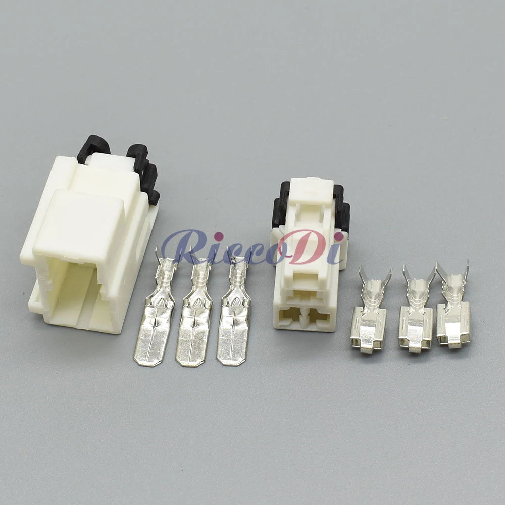 Close-up of 3 hole auto wiring harness connector plug terminals 7122-6030 7123-6030 for vehicles