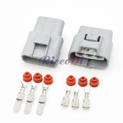 Close-up of terminals in 3-hole automotive electric fan control connector