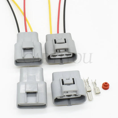 Detailed view of waterproof seal and pins in 3-hole automotive electric fan connector
