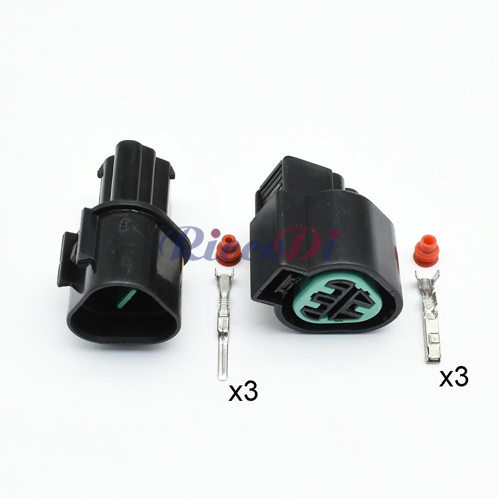 Close-up of 3-pin automotive headlight connector PB625-03027 PB621-03020 showing secure terminals