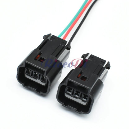 Close-up of female terminals in 3-pin automotive waterproof connector
