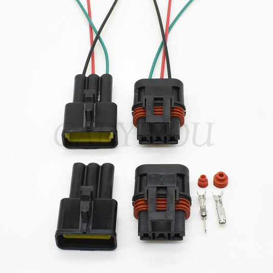 Close-up of male and female terminals in 3-pin sealed wiring harness auto connector