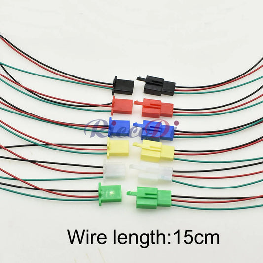 Close-up of 3-pin female and male terminals in automotive wire harness connector