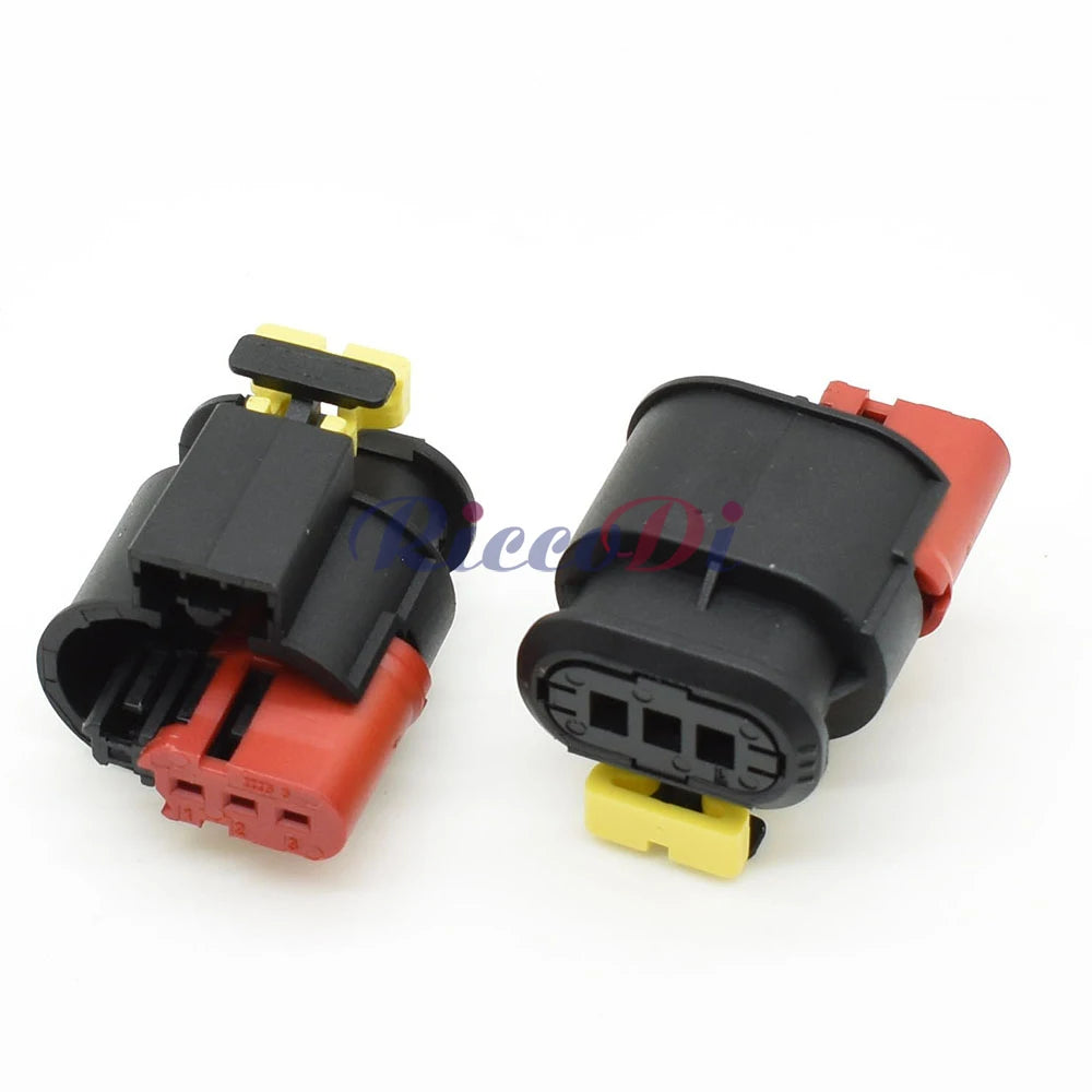 Close-up of male and female terminals in 3-pin sealed automotive injector wire harness connector