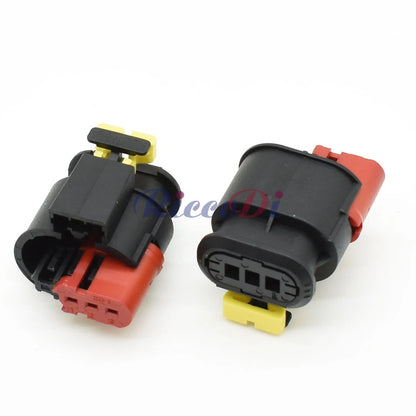 Close-up of male and female terminals in 3-pin sealed automotive injector wire harness connector
