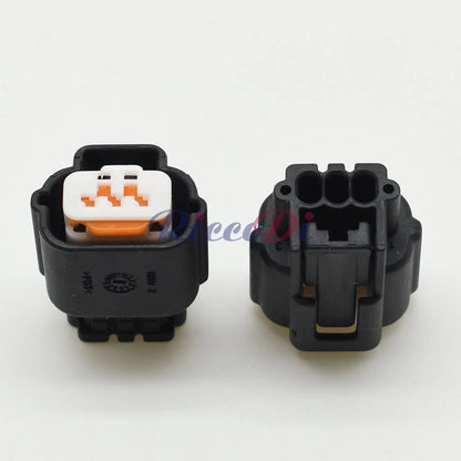 Detailed view of waterproof seal and pins in 3-pin automotive electrical connector for Mitsubishi